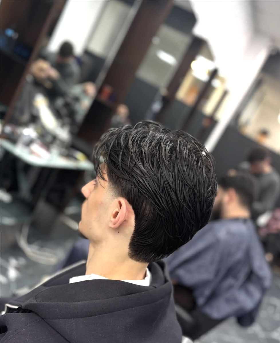Taper Fade haarsnit - Moderne fade kapsel bij Ossy Kapsalon Amsterdam Osdorp